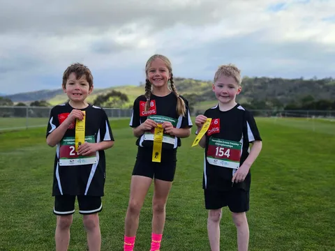 Young Claremont Little Athletics athletes with ribbons